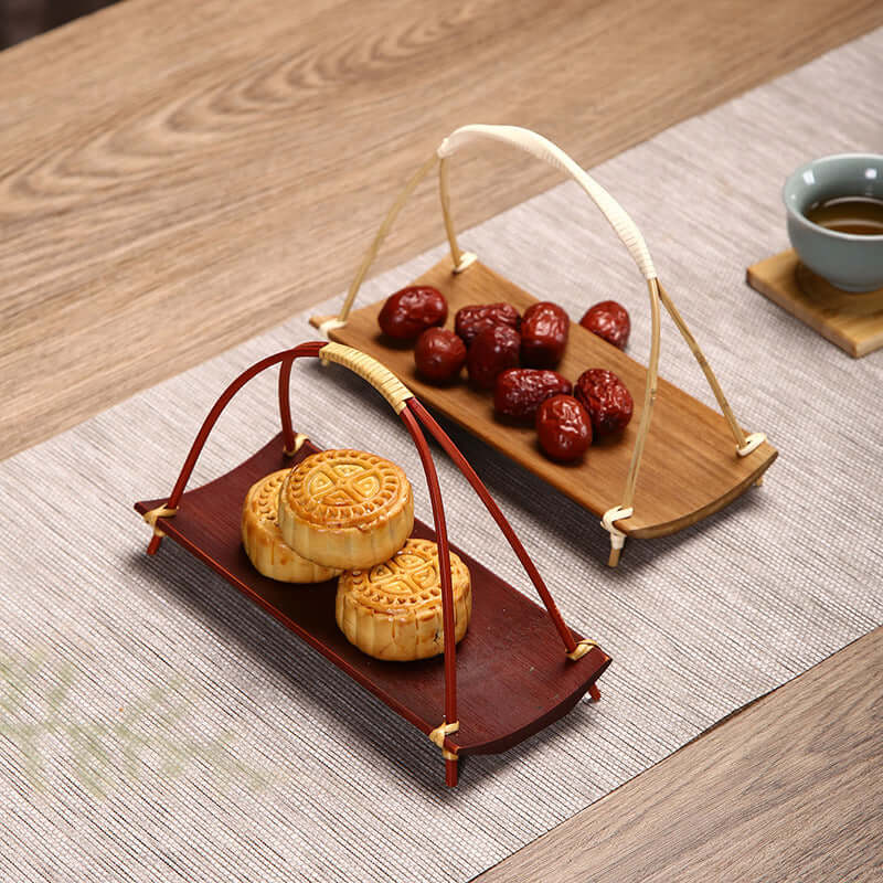 Handmade bamboo tea and snack tray with Japanese dim sum design
