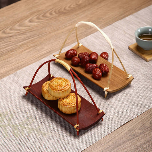 Handmade bamboo tea and snack tray with Japanese dim sum design
