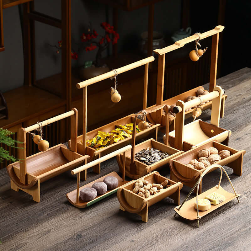 Bamboo basket on wooden table with fruits
