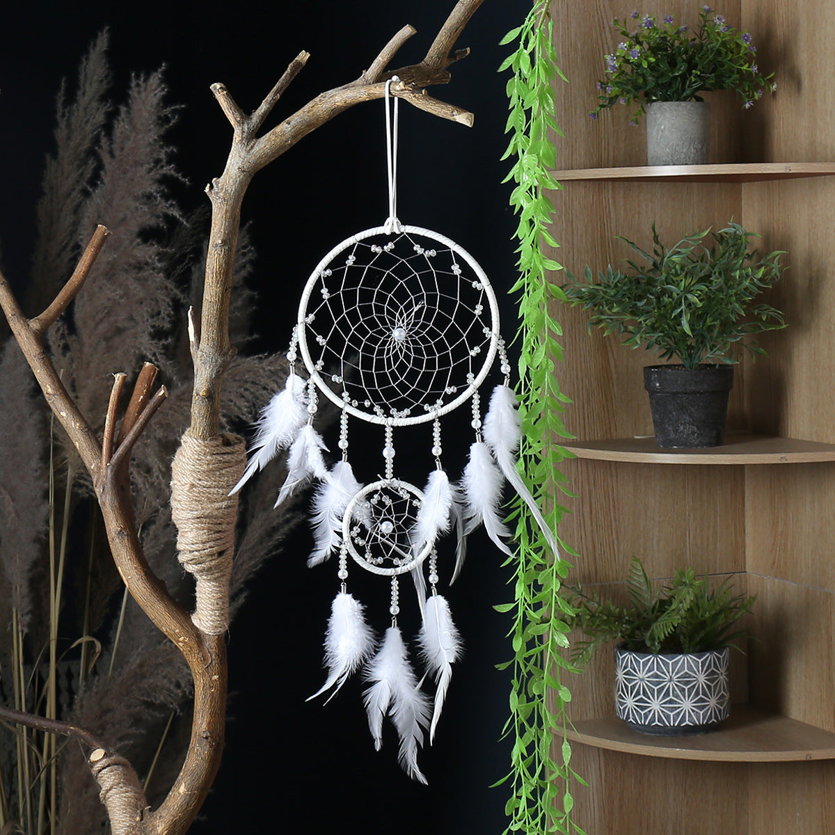 Minimalist white hoop dreamcatcher with neutral threads
