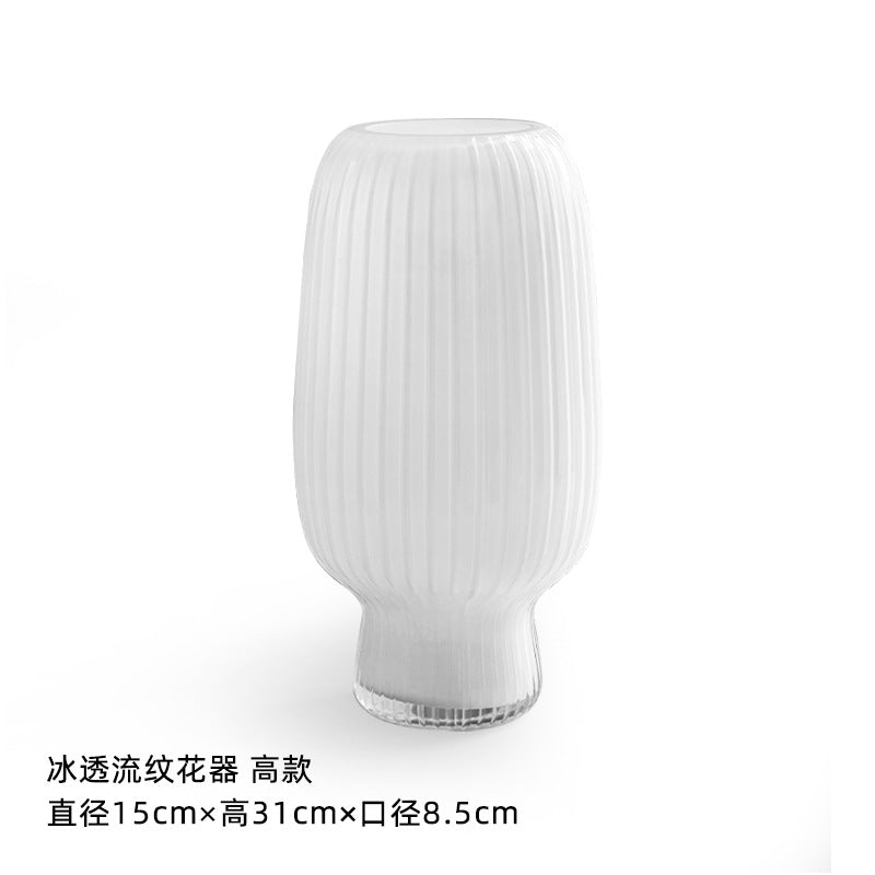 Wide cylindrical glass vase with frosted white surface
