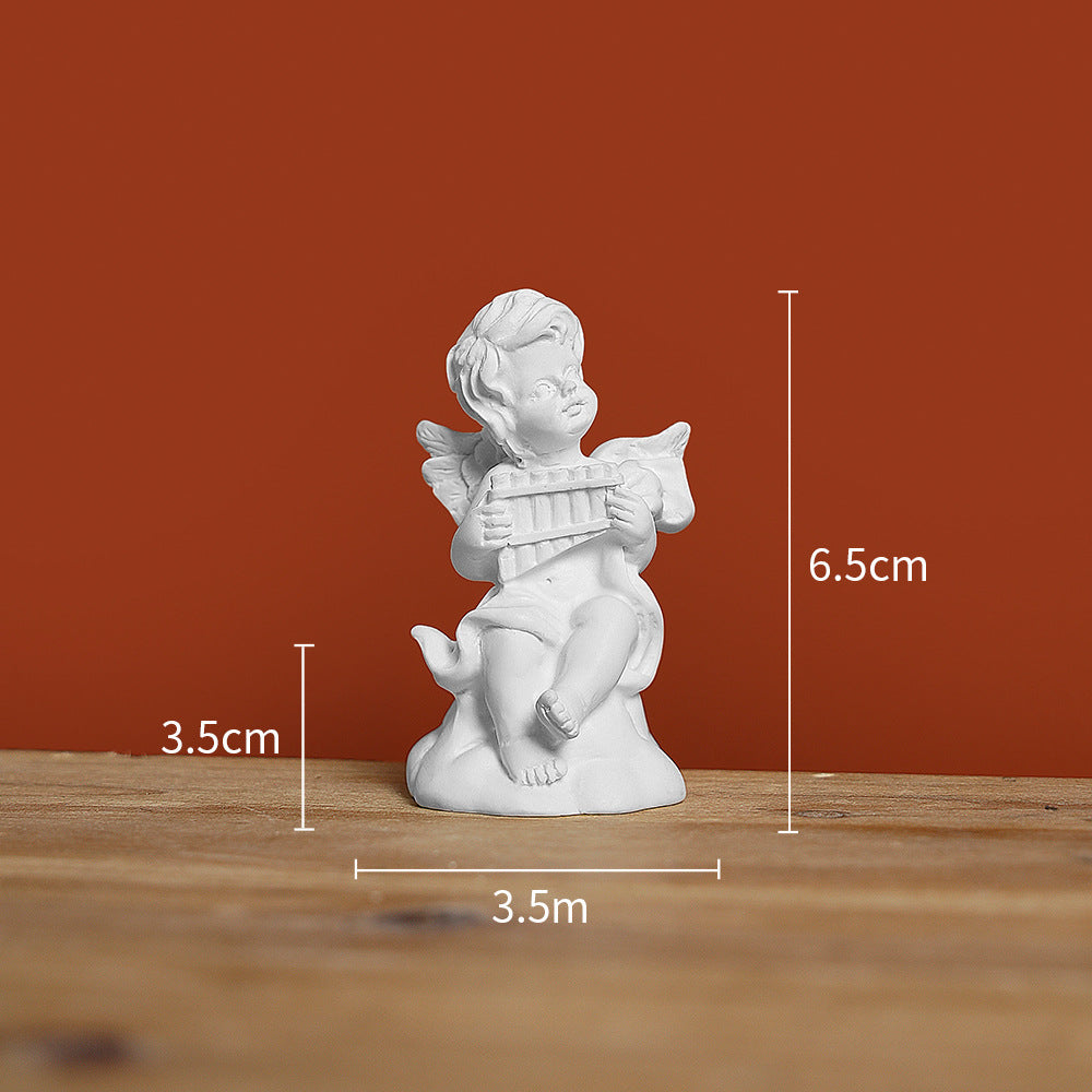 Resin angel figurine playing pipa instrument
