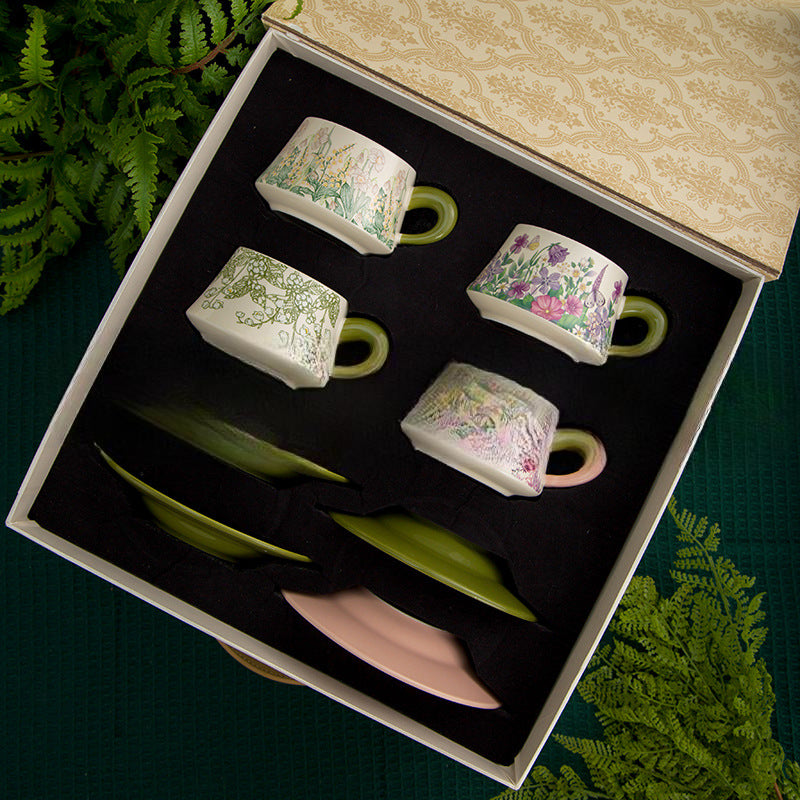 Set of 4 unique floral cups with matching saucers in gift box
