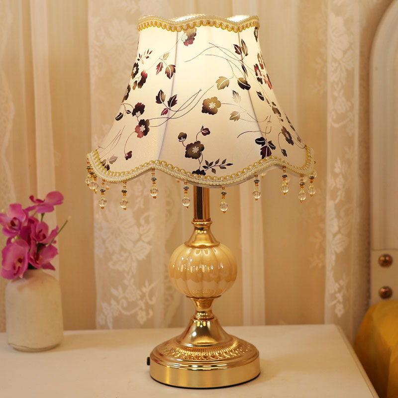 Classic curve fabric lamp on side table
