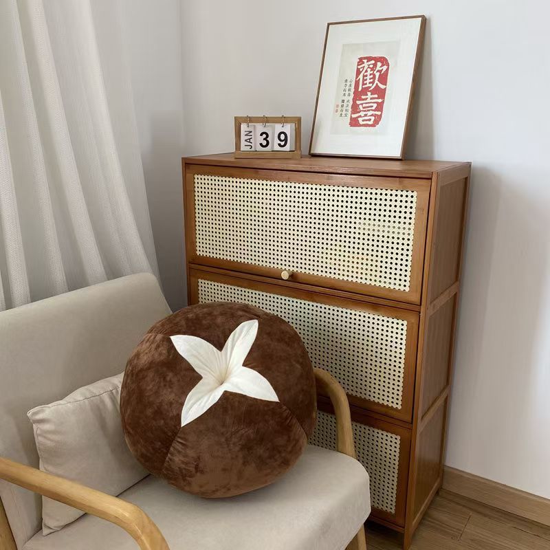 Shiitake mushroom plush pillow with curved top
