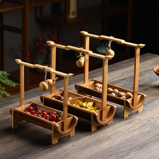 Handmade bamboo fruit basket with decorative gourd
