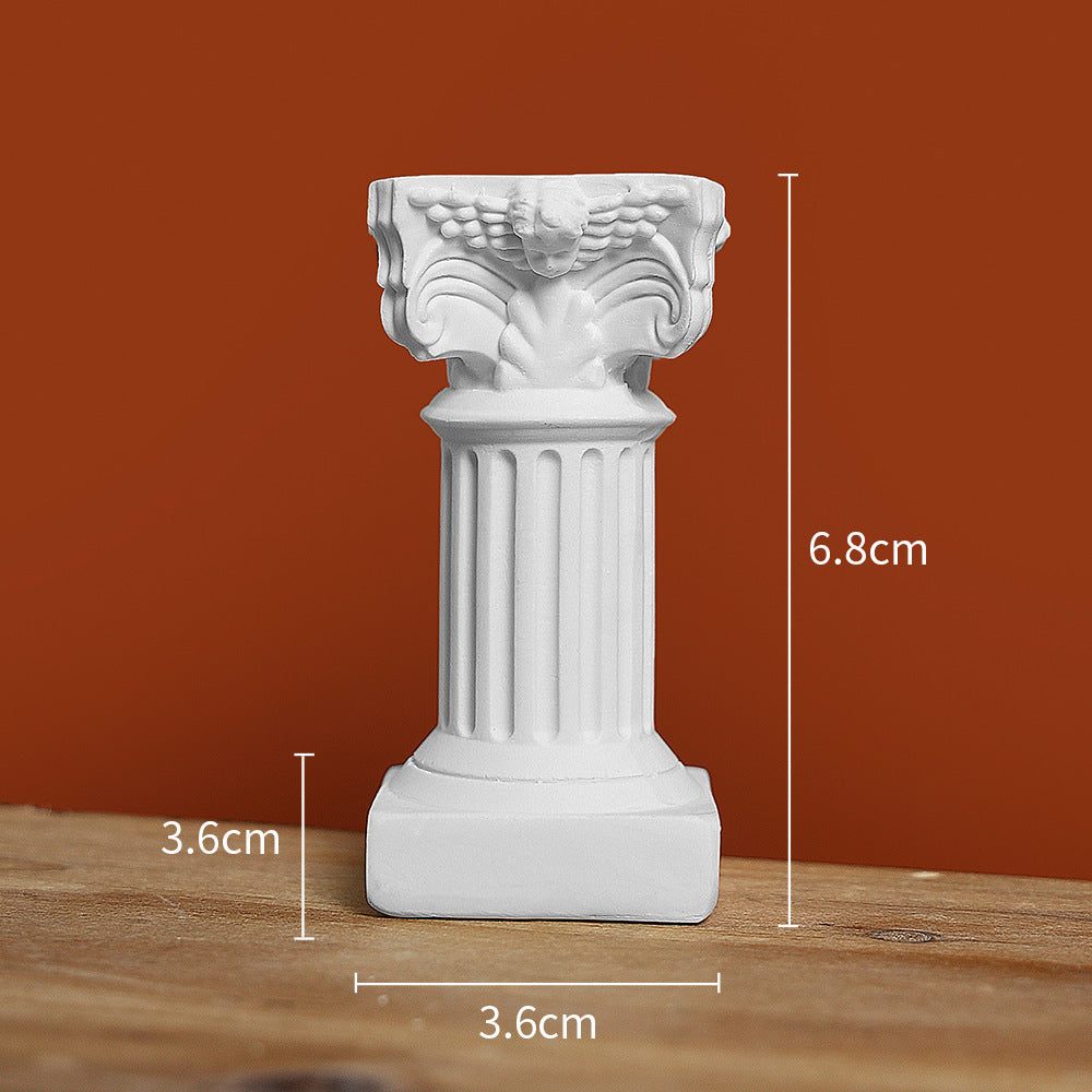 Gold-tipped Roman column in luxury setting
