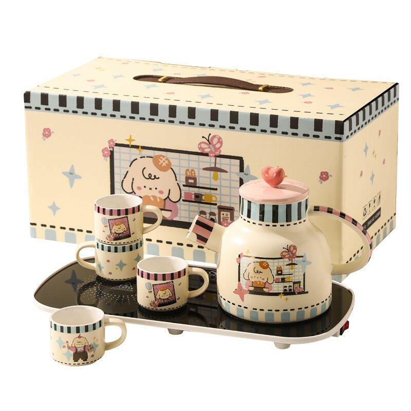 Tea set with thermostatic warming pad displayed
