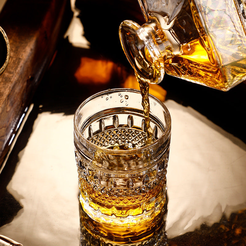 Decanter and glass shown from top and diagonal angles

