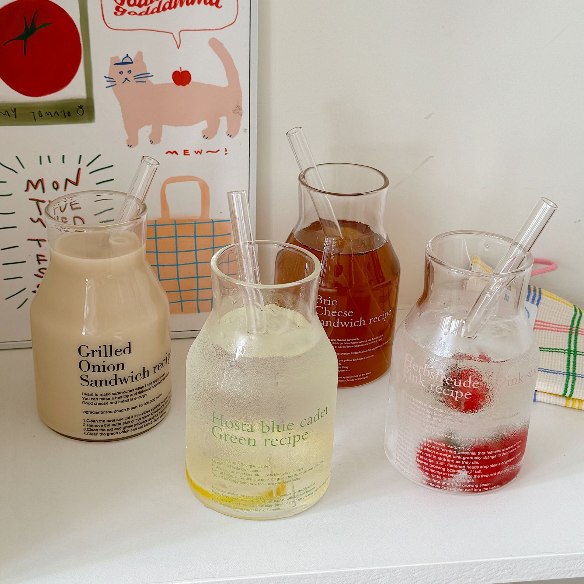 4 mugs arranged on clean, Scandinavian-style table
