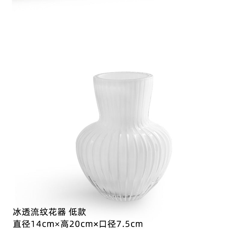 Slim trumpet glass vase with vertical textured pattern
