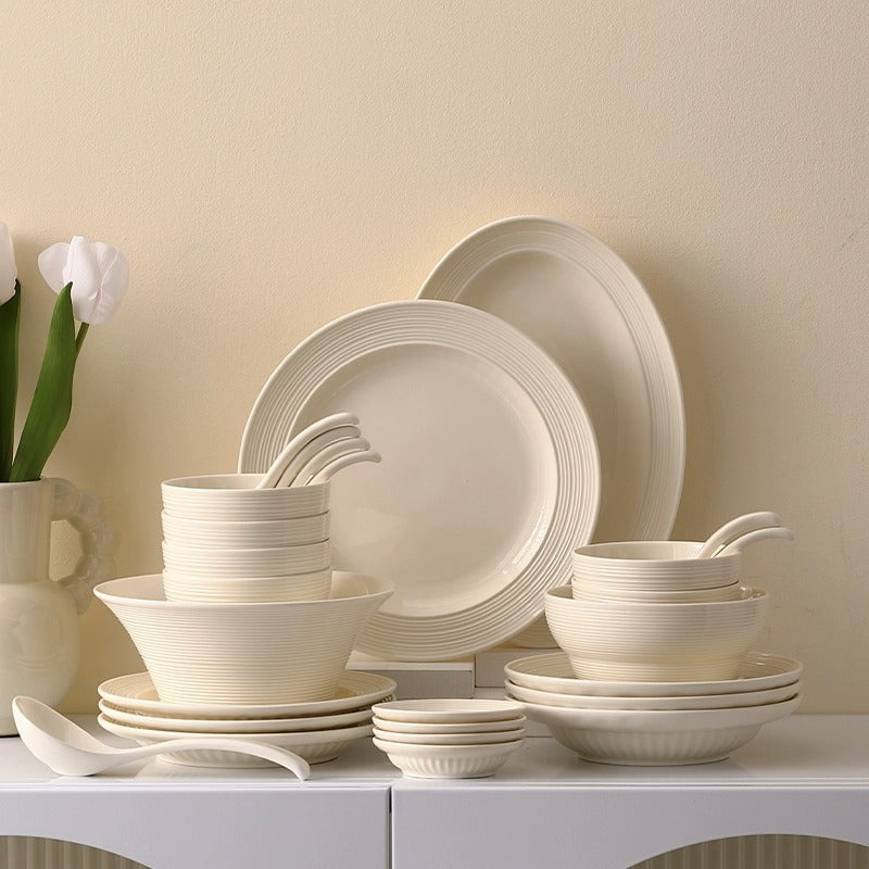 Complete table setting with all pieces on Nordic table
