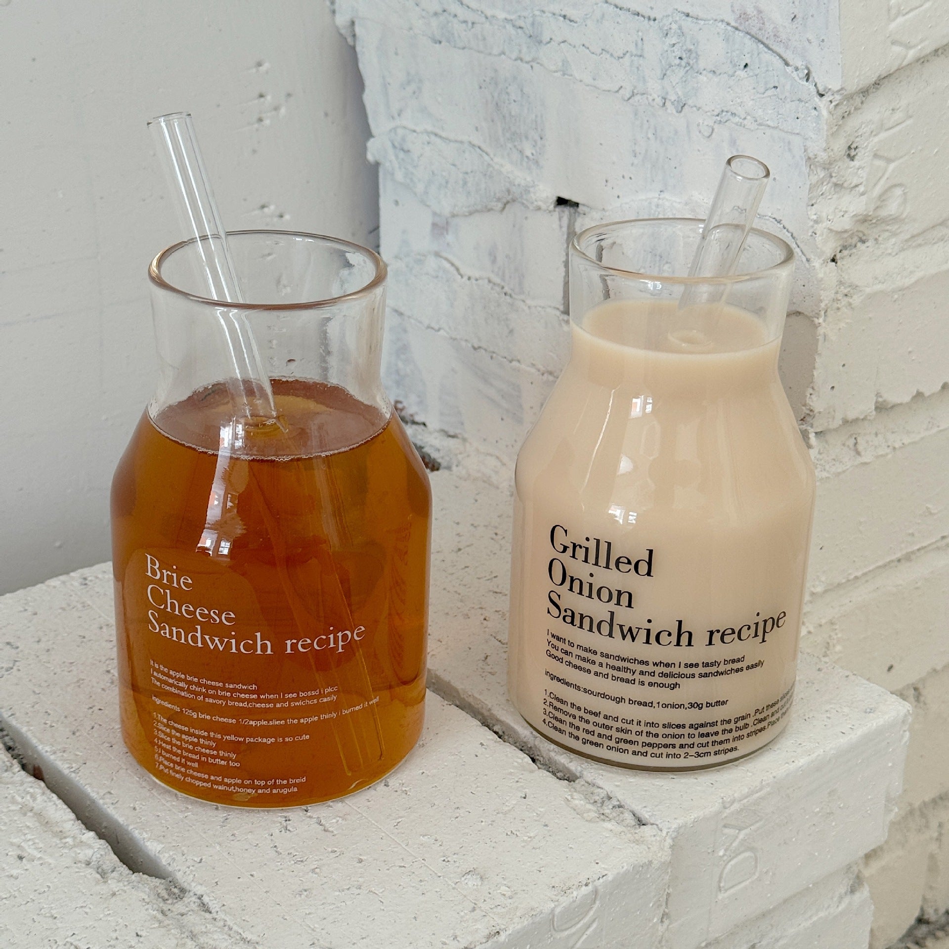 ShonD™ Wind Letter Glass Cup with steam rising in minimalist room
