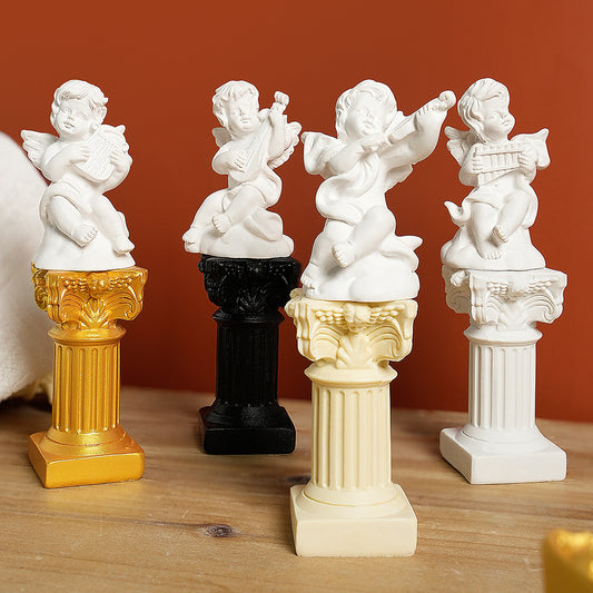 Resin Roman columns and angel figurines in assorted finishes
