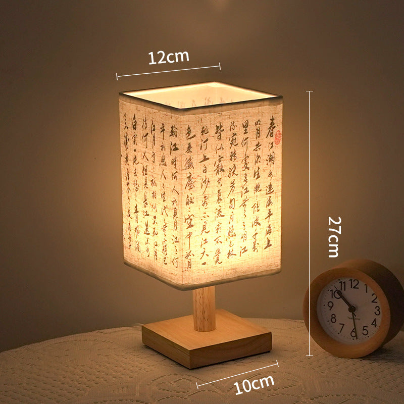 Artistic calligraphy night light in serene setting
