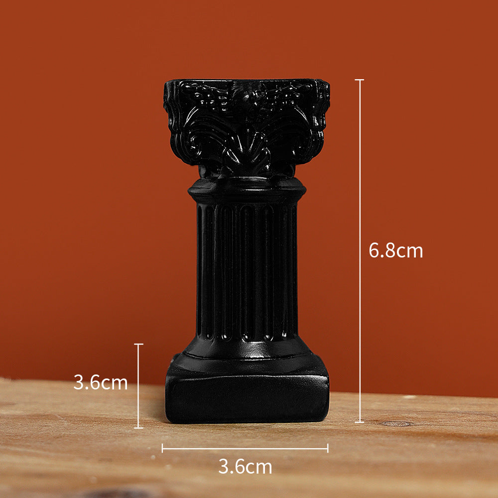Matte black decorative column figurine
