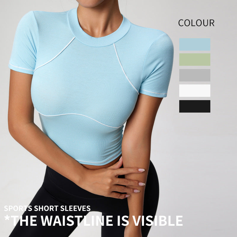 Light blue athletic top worn by a person on a plain background with color swatches.