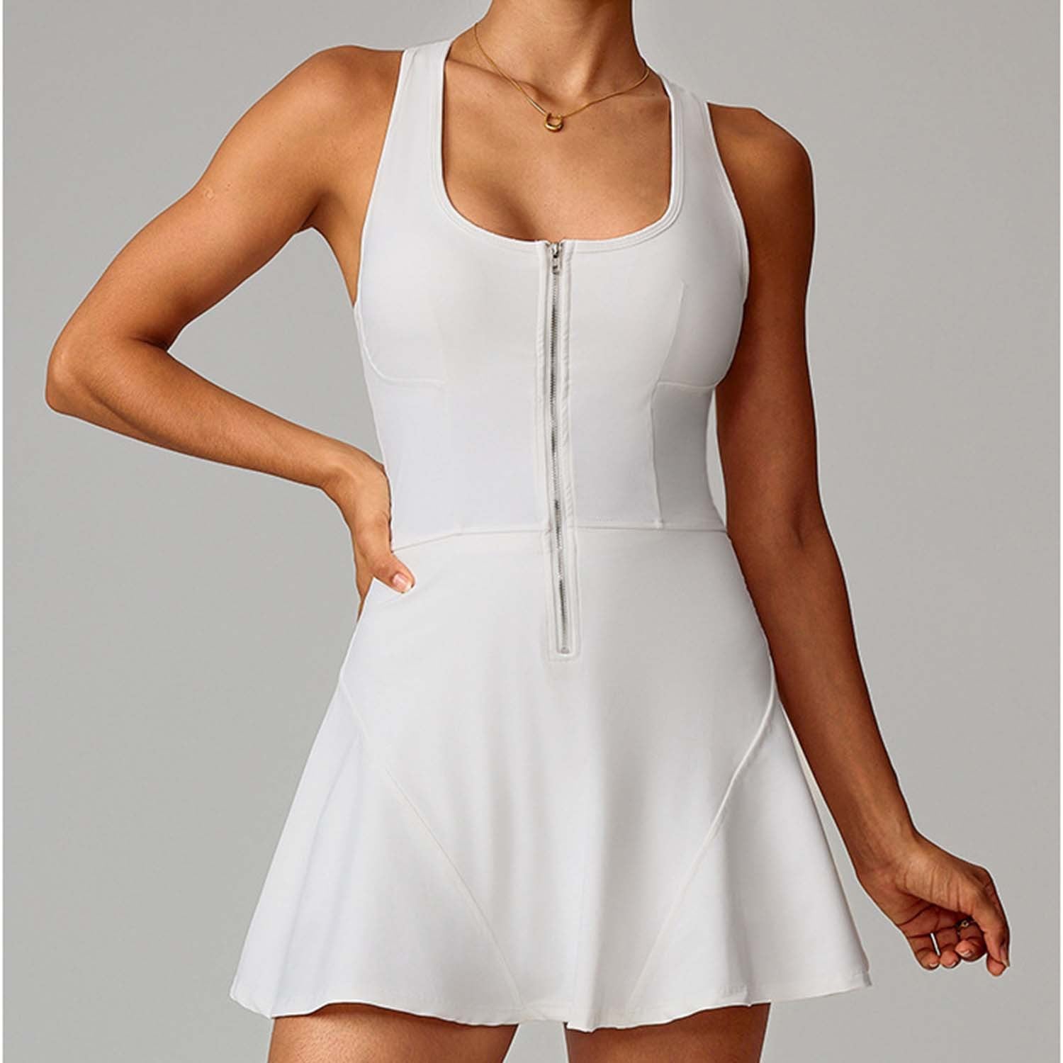 White sleeveless dress with a zipper on a gray background