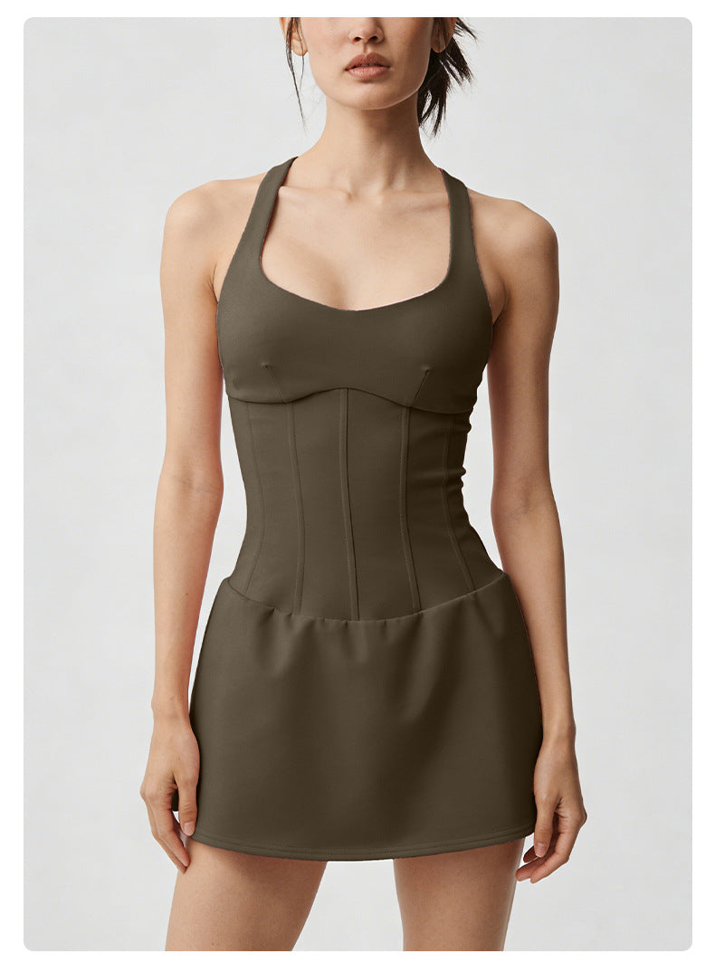 Woman wearing a brown dress against a white background
