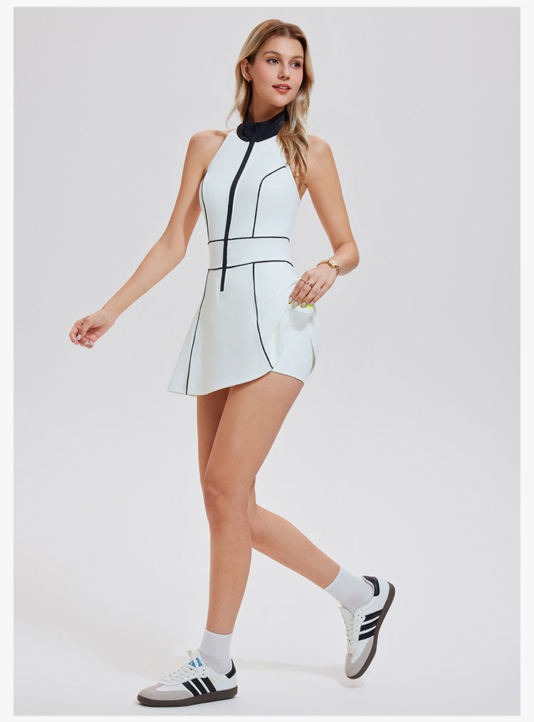 Woman wearing a white dress with black accents and Adidas shoes on a light gray background