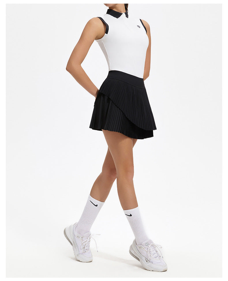 Person wearing a white sleeveless top and black pleated skirt with Nike socks and shoes on a white background