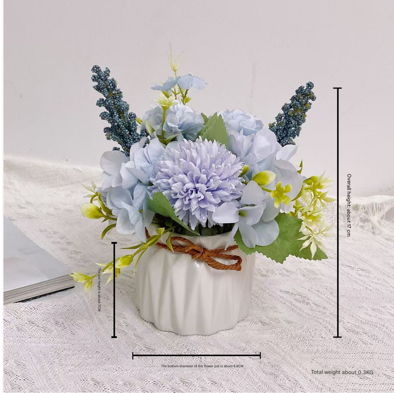Close-up of blue hydrangea petals in sculptural white base
