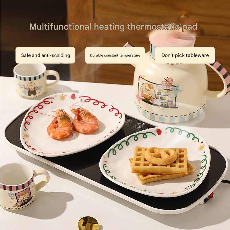 Tea set with thermostatic warming pad displayed
