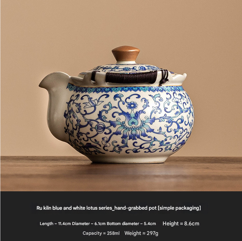 Small handcrafted Shih Tzu teapot with lotus design and Ru Kiln glaze
